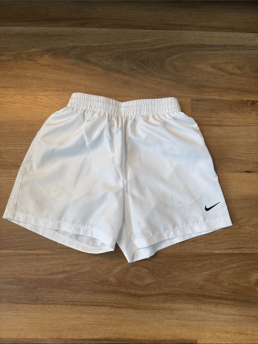 Nike White Shorts with Black Swoosh Accent